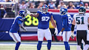 Oct 20, 2024; East Rutherford, New Jersey, USA; New York Giants defensive tackle Dexter Lawrence II (97) celebrates after a sack during the first half against the Philadelphia Eagles at MetLife Stadium. 