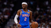 May 15, 2025; Denver, Colorado, USA; Oklahoma City Thunder guard Shai Gilgeous-Alexander (2) dribbles the ball up court in the second quarter against the Denver Nuggets during game six of the second round for the 2025 NBA Playoffs at Ball Arena. Mandatory Credit: Isaiah J. Downing-Imagn Images