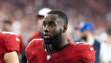 Aug 9, 2025; Glendale, Arizona, USA; Arizona Cardinals running back Trey Benson (33) against the Kansas City Chiefs during a preseason NFL game at State Farm Stadium. Mandatory Credit: Mark J. Rebilas-Imagn Images