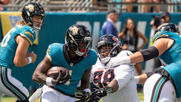 Jacksonville Jaguars running back Travis Etienne (1) finds a hole during the first quarter between the Houston Texans and the Jacksonville Jaguars Sunday September 21, 2025 at EverBank Stadium in Jacksonville, Fla. [Doug Engle/Florida Times-Union]