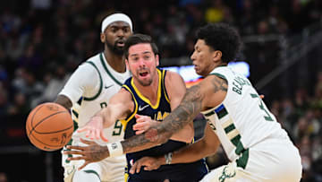 Dec 13, 2023; Milwaukee, Wisconsin, USA; Indiana Pacers guard T.J. McConnell (9) gets a pass away