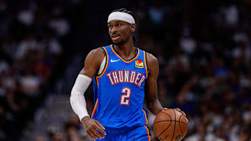 May 15, 2025; Denver, Colorado, USA; Oklahoma City Thunder guard Shai Gilgeous-Alexander (2) dribbles the ball up court in the second quarter against the Denver Nuggets during game six of the second round for the 2025 NBA Playoffs at Ball Arena. Mandatory Credit: Isaiah J. Downing-Imagn Images