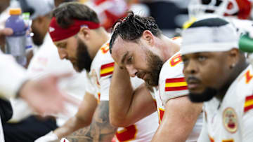 Feb 9, 2025; New Orleans, LA, USA;  Kansas City Chiefs tight end Travis Kelce (87) reacts on the bench in the fourth quarter against the Philadelphia Eagles in Super Bowl LIX at Ceasars Superdome. Mandatory Credit: Mark J. Rebilas-Imagn Images
