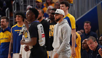 Golden State Warriors guard Stephen Curry watches against the Minnesota Timberwolves during the 2025 NBA Playoffs