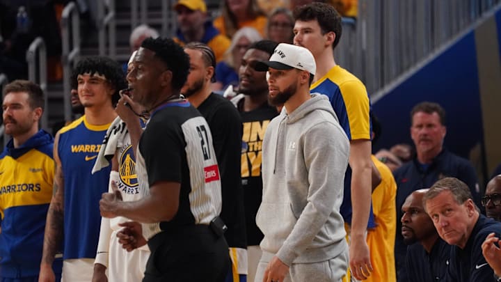Golden State Warriors guard Stephen Curry watches against the Minnesota Timberwolves during the 2025 NBA Playoffs