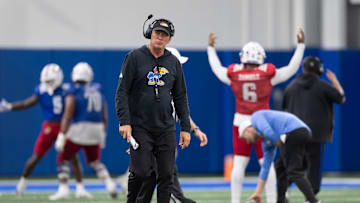 Kansas head coach Lance Leipold watches practice during Kansas Football Fan Appreciation Day Saturday, April. 5, 2025 at the Kansas Football Indoor Practice Facility in Lawrence, Kan.