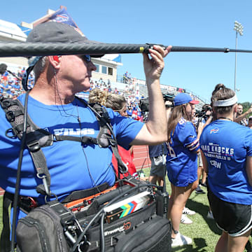 A camera crew from Hard Knocks follow Bills quarterback Josh Allen as he signs autographs for fans during the opening day of Buffalo Bills training camp at St. John Fisher University Wednesday, July 23, 2025 in Pittsford.
