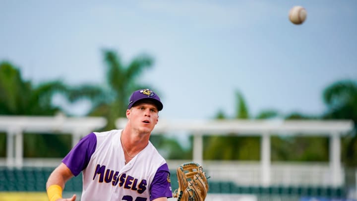 Fort Myers Mighty Mussels outfielder Walker Jenkins (27) catches a ball from the dugout during the second inning of a game against the Tampa Tarpons at Hammond Stadium in Fort Myers on Friday, June 28, 2024.