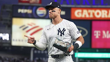 Oct 5, 2024; Bronx, New York, USA; New York Yankees outfielder Aaron Judge (99) reacts at the end of the top of the first inning against Kansas City Royals during game one of the ALDS for the 2024 MLB Playoffs at Yankee Stadium. Mandatory Credit: Vincent Carchietta-Imagn Images