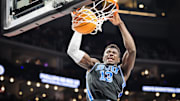 Mar 14, 2025; Kansas City, MO, USA; Brigham Young Cougars center Keba Keita (13) dunks during the second half against the Houston Cougars at T-Mobile Center. Mandatory Credit: William Purnell-Imagn Images