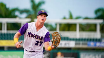 Fort Myers Mighty Mussels outfielder Walker Jenkins (27) catches a ball from the dugout during the second inning of a game against the Tampa Tarpons at Hammond Stadium in Fort Myers on Friday, June 28, 2024.