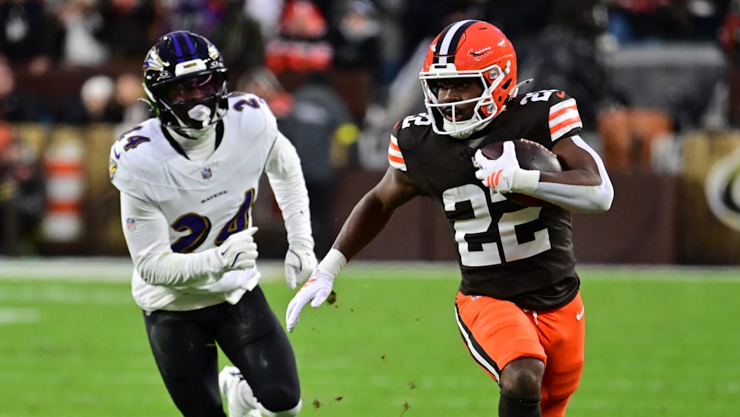 Nov 16, 2025; Cleveland, Ohio, USA; Cleveland Browns running back Dylan Sampson (22) runs for a gain past Baltimore Ravens safety Malaki Starks (24) during the first quarter at Huntington Bank Field. Mandatory Credit: Ken Blaze-Imagn Images Nov 16, 2025; Cleveland, Ohio, USA; Cleveland Browns running back Dylan Sampson (22) runs for a gain past Baltimore Ravens safety Malaki Starks (24) during the first quarter at Huntington Bank Field. Mandatory Credit: Ken Blaze-Imagn Images