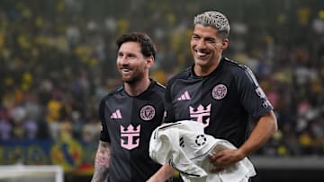 Jan 18, 2025; Las Vegas, Nevada, USA; Inter Miami CF forward Lionel Messi (10) and Inter Miami CF forward Luis Suarez (9) walk off the field laughing at the end of regulation against Club America at Allegiant Stadium. Mandatory Credit: David Gonzales-Imagn Images