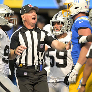 Sep 8, 2024; Inglewood, California, USA; Officials separate Las Vegas Raiders tight end Harrison Bryant (84) and Los Angeles Chargers tight end Will Dissly (81) after a fight in the second half at SoFi Stadium. Mandatory Credit: Jayne Kamin-Oncea-Imagn Images