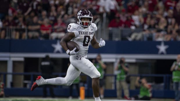 Texas A&M Aggies wide receiver Evan Stewart (1) returns a punt for a touchdown