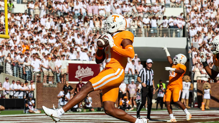 Sep 27, 2025; Starkville, Mississippi, USA; Tennessee Volunteers defensive back Colton Hood (8) scores a touchdown after an interception against the Mississippi State Bulldogs during the first half at Davis Wade Stadium at Scott Field. Mandatory Credit: Wesley Hale-Imagn Images