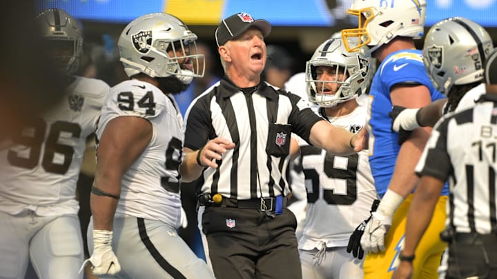 Sep 8, 2024; Inglewood, California, USA; Officials separate Las Vegas Raiders tight end Harrison Bryant (84) and Los Angeles Chargers tight end Will Dissly (81) after a fight in the second half at SoFi Stadium. Mandatory Credit: Jayne Kamin-Oncea-Imagn Images