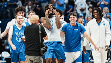 Kentucky Wildcats' Kam Williams sunk a half-court shot for a fan at the 2025 Big Blue Madness at Rupp Arena in Lexington, Kentucky Saturday, Oct. 11, 2025.