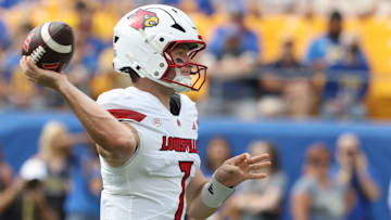 Louisville Cardinals quarterback Miller Moss (7)