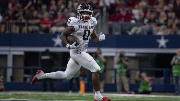 Texas A&M Aggies wide receiver Evan Stewart (1) returns a punt for a touchdown against the Arkansas Razorbacks during the sec