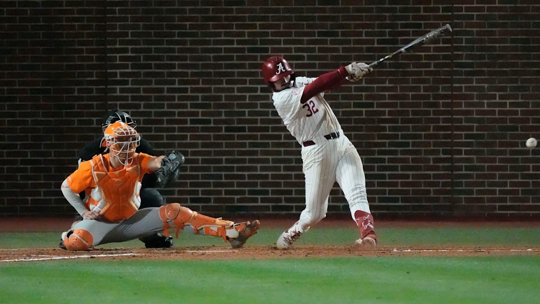 Mar 21, 2025; Tuscaloosa AL, USA; Alabama third baseman Jason Torres (32) connects with a pitch during the second game of the series with Tennessee at Sewell-Thomas Stadium.