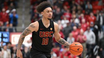 Feb 29, 2024; Pullman, Washington, USA; USC Trojans forward DJ Rodman (10) controls the ball against the Washington State Cougars in the second half at Friel Court at Beasley Coliseum. Washington State Cougars won 75-72. Mandatory Credit: James Snook-Imagn Images