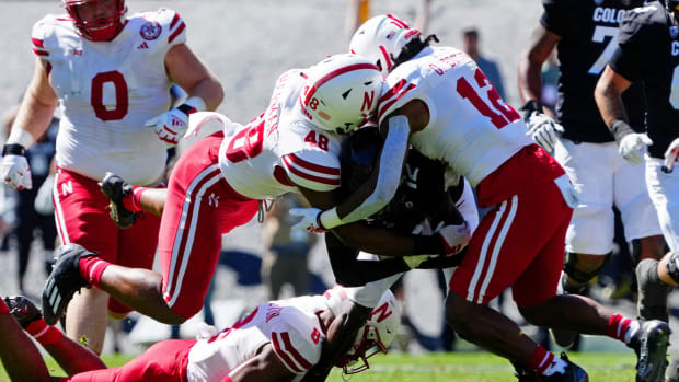 Nebraska Cornhuskers defensive back Omar Brown (12) and linebacker MJ Sherman (48) 