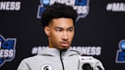 Mar 27, 2025; Atlanta, GA, USA; Michigan State Spartans guard Jaden Akins (3) addresses the media in a press conference during NCAA Tournament South Regional Practice at State Farm Arena. Mandatory Credit: Brett Davis-Imagn Images