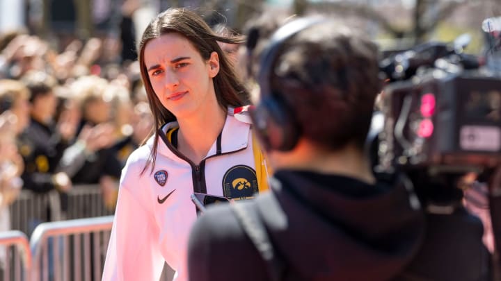 Iowa Hawkeyes guard Caitlin Clark (22) arrives for the NCAA Tournament championship basketball game at Rocket Mortgage Fieldhouse, Sunday, April 7, 2024 in Cleveland.