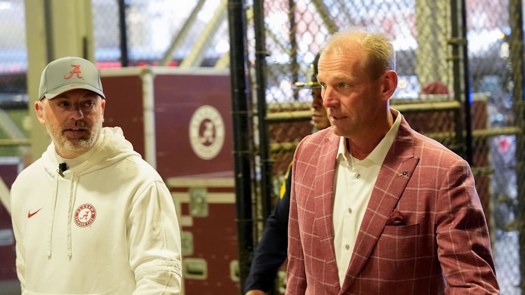 Nov 29, 2025; Auburn, Alabama, USA; Alabama head coach Kalen DeBoer enters Jordan-Hare Stadium ahead of the game with Auburn in the 2025 Iron Bowl. Mandatory Credit: Gary Cosby Jr.-Tuscaloosa News