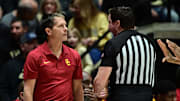 Feb 7, 2025; West Lafayette, Indiana, USA; USC Trojans head coach Eric Musselman shares a moment with a referee during the first half against the Purdue Boilermakers at Mackey Arena. Mandatory Credit: Marc Lebryk-Imagn Images