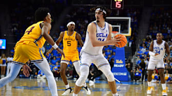 Mar 2, 2023; Los Angeles, California, USA; UCLA Bruins guard Jaime Jaquez Jr. (24) controls the ball against Arizona State Sun Devils guard Desmond Cambridge Jr. (4) during the second half at Pauley Pavilion. Mandatory Credit: Gary A. Vasquez-Imagn Images