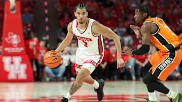 Houston point guard Milos Uzan (with ball)
