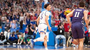 Kansas Jayhawks guard Zeke Mayo (5) reacts after making a three-pointer against the Kansas State Wildcats in the first half of the Sunflower Showdown game inside Allen Fieldhouse Saturday, Jan. 18, 2025.