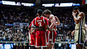 Nebraska basketball players, including Brice Williams and Braxton Meah, huddle at Purdue on Jan. 12, 2025.