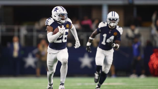 Dallas Cowboys cornerback DaRon Bland (26) returns an interception for a touchdown 