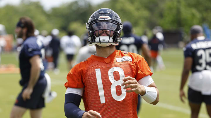 Jun 5, 2024; Lake Forest, IL, USA; Chicago Bears quarterback Caleb Williams (18) warms up during the team's minicamp at Halas Hall. Mandatory Credit: Kamil Krzaczynski-USA TODAY Sports