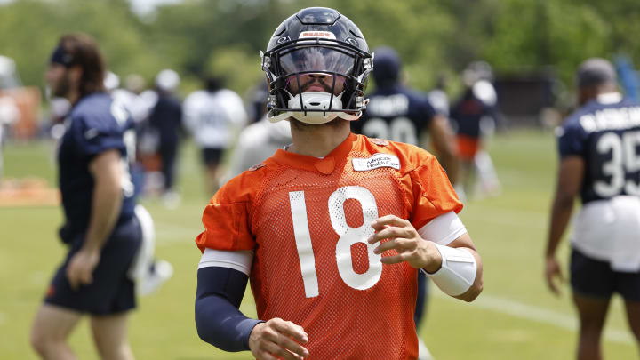 Jun 5, 2024; Lake Forest, IL, USA; Chicago Bears quarterback Caleb Williams (18) warms up during the team's minicamp at Halas Hall. Mandatory Credit: Kamil Krzaczynski-USA TODAY Sports