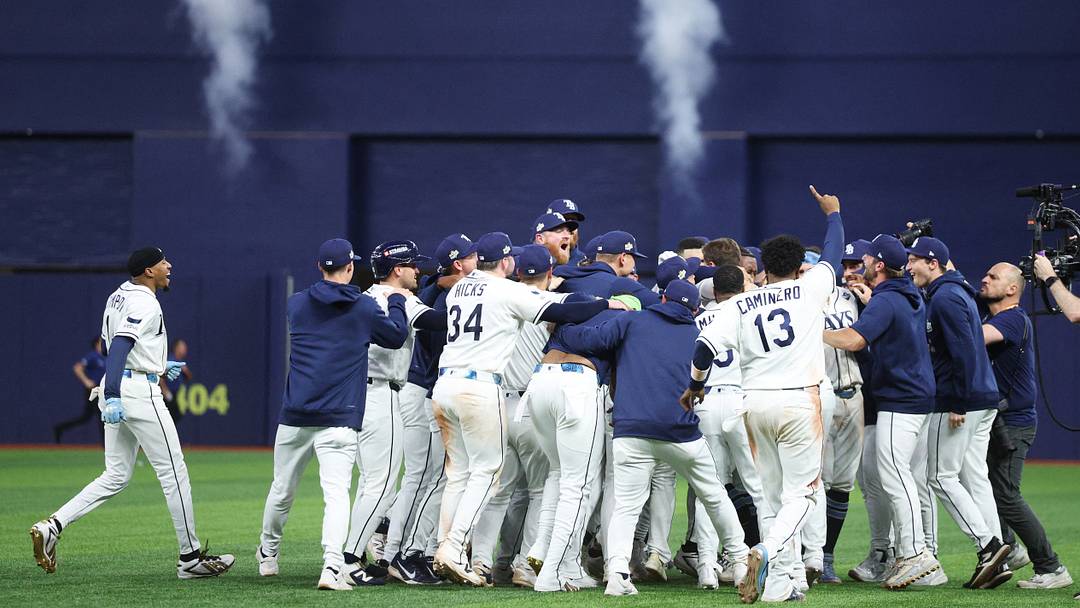 Oct 27, 2026; St. Petersburg, Florida, USA; The Tampa Bay Rays celebrate after defeating the Milwaukee Brewers in game four of the 2026 World Series at Tropicana Field. Mandatory Credit: Nathan Ray Seebeck-Imagn Images