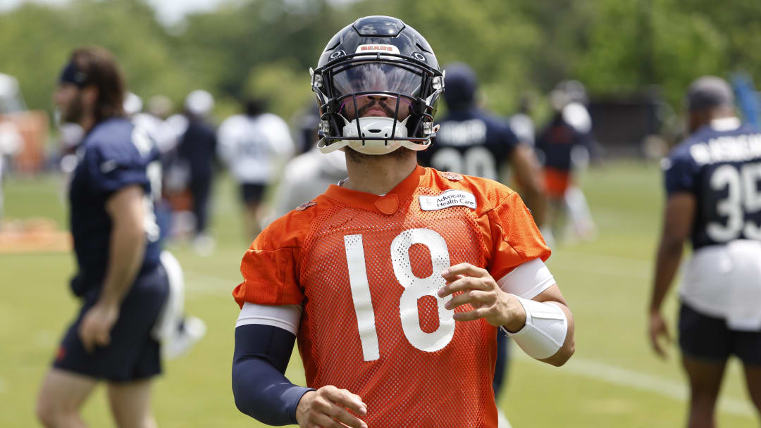 Jun 5, 2024; Lake Forest, IL, USA; Chicago Bears quarterback Caleb Williams (18) warms up during the team's minicamp at Halas Hall. Mandatory Credit: Kamil Krzaczynski-USA TODAY Sports