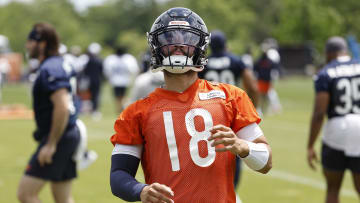 Jun 5, 2024; Lake Forest, IL, USA; Chicago Bears quarterback Caleb Williams (18) warms up during the team's minicamp at Halas Hall. Mandatory Credit: Kamil Krzaczynski-USA TODAY Sports