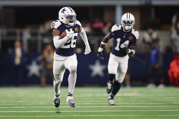 Dallas Cowboys cornerback DaRon Bland (26) returns an interception for a touchdown