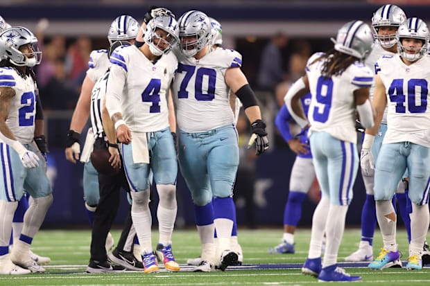 Dallas Cowboys quarterback Dak Prescott and guard Zack Martin celebrate during the second half against the Seattle Seahawks. Dallas Cowboys quarterback Dak Prescott and guard Zack Martin celebrate during the second half against the Seattle Seahawks.