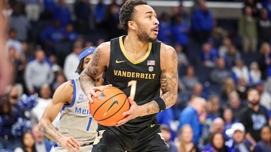 Vanderbilt guard Frankie Collins looks to pass the ball against the Memphis Tigers.