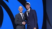 Cooper Flagg poses with NBA commissioner Adam Silver after being selected as first overall by the Dallas Mavericks.