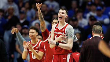 Feb 1, 2025; Lexington, Kentucky, USA; Arkansas Razorbacks forward Zvonimir Ivisic (44) celebrates from the bench during the second half against the Kentucky Wildcats at Rupp Arena at Central Bank Center. Mandatory Credit: Jordan Prather-Imagn Images
