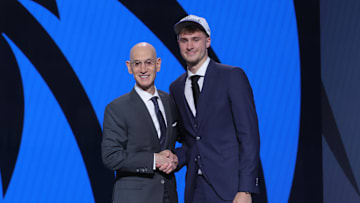 Cooper Flagg poses with NBA commissioner Adam Silver after being selected as first overall by the Dallas Mavericks.