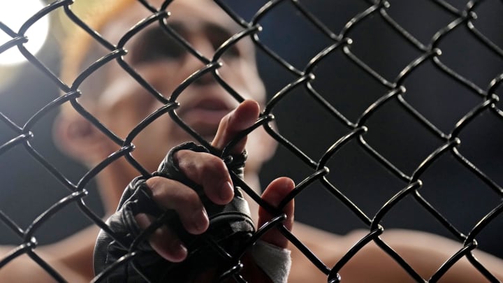 Sep 10, 2022; Las Vegas, Nevada, USA; Nate Diaz (red gloves) fights Tony Ferguson (blue gloves) during UFC 279 at T-Mobile Arena. Mandatory Credit: Joe Camporeale-USA TODAY Sports