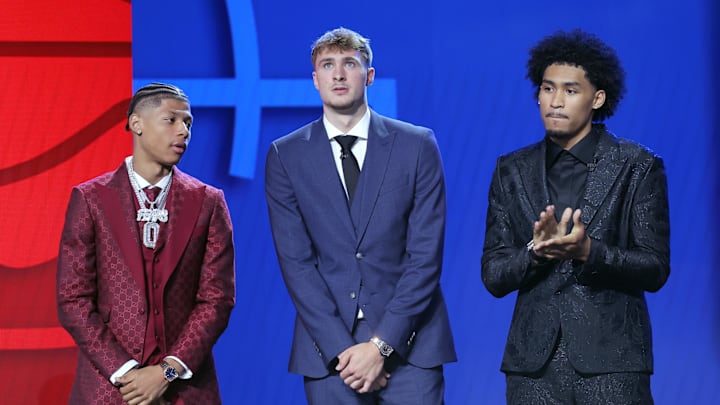Top NBA Draft prospects Jeremiah Fears, Cooper Flagg, and Dylan Harper stand on stage before the 2025 NBA Draft Top NBA Draft prospects Jeremiah Fears, Cooper Flagg, and Dylan Harper stand on stage before the 2025 NBA Draft