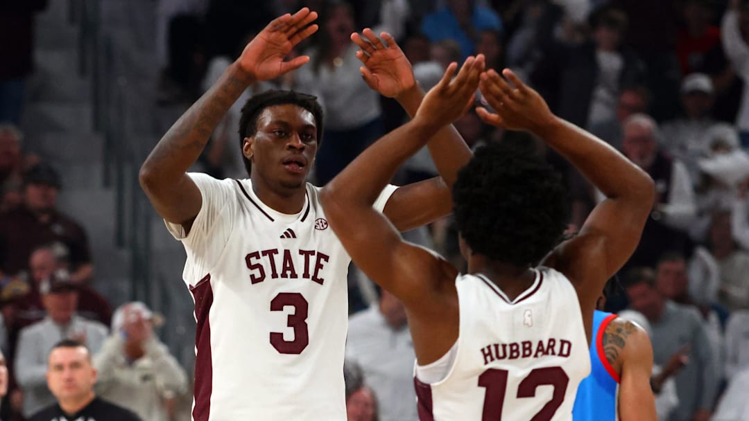 Jan 18, 2025; Starkville, Mississippi, USA; Mississippi State Bulldogs forward KeShawn Murphy (3) reacts with guard Josh Hubbard (12) during the first half against the Mississippi Rebels at Humphrey Coliseum. 